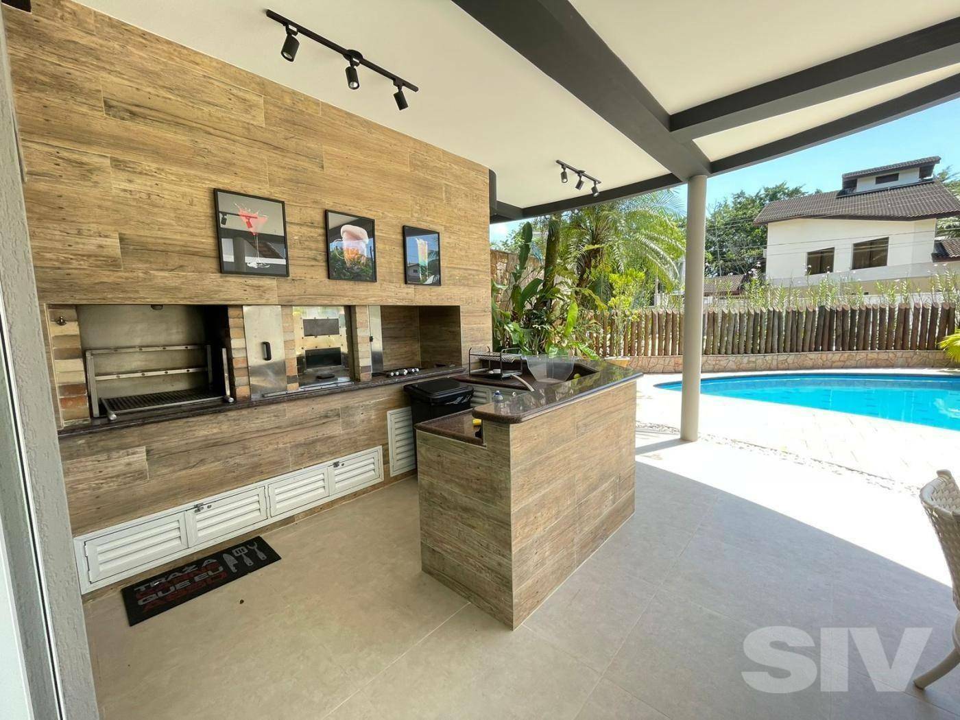 Casa com 5 dormitórios à venda, 434 m² por R$ 7.500.000,00 – Riviera Módulo 21 – Bertioga/SP