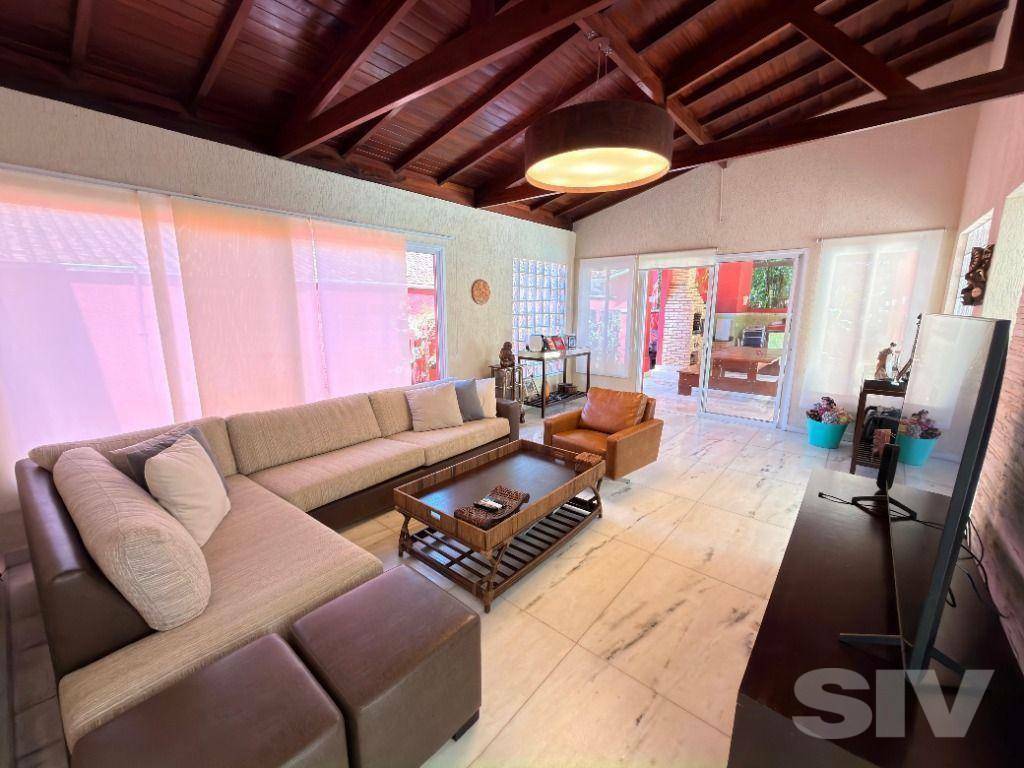 Casa com 5 dormitórios à venda, 310 m² por R$ 4.500.000,00 – Riviera Módulo 20 – Bertioga/SP